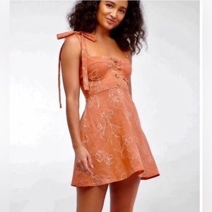 bustier sundress with floral print and bow sleeves